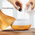 products/ultrasonic-essential-oil-diffuser-humidifier-various-colors-humidifier-dark-wood-us-geekyget-2_e2f47ba0-144d-459c-b3a8-62486f621b06.jpg
